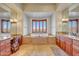 Spa-like bathroom featuring a luxurious soaking tub and dual vanities at 9624 N Copper Ridge Trl, Fountain Hills, AZ 85268