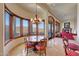 Elegant dining room with large windows offering scenic views at 9624 N Copper Ridge Trl, Fountain Hills, AZ 85268