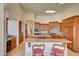 Kitchen with granite countertops, custom cabinetry, and wine cooler at 9624 N Copper Ridge Trl, Fountain Hills, AZ 85268