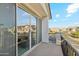 Private balcony with sliding glass doors and community view at 9835 E Stratus Ave, Mesa, AZ 85212