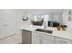 Modern kitchen with white cabinets, stainless steel appliances, and an island at 9835 E Stratus Ave, Mesa, AZ 85212