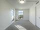 Spacious bedroom with large window offering natural light and carpet at 10410 N Cave Creek Rd # 1220, Phoenix, AZ 85020