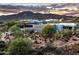 Luxury home with mountain views at sunset at 11541 E Salero Dr, Scottsdale, AZ 85262