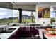 Sleek kitchen with stainless steel countertops and mountain views at 11541 E Salero Dr, Scottsdale, AZ 85262