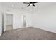 Bedroom with carpet flooring and en-suite bathroom at 12360 W Delwood Dr, Arizona City, AZ 85123