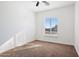 Bright bedroom with carpeted floor and window at 12360 W Delwood Dr, Arizona City, AZ 85123