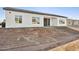 House exterior back view, showing patio and yard at 12360 W Delwood Dr, Arizona City, AZ 85123