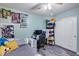 Bedroom with built-in desk, shelves, and lots of character at 12409 W Montebello Ave, Litchfield Park, AZ 85340