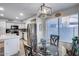 Modern kitchen featuring white cabinets and stainless steel appliances at 12409 W Montebello Ave, Litchfield Park, AZ 85340