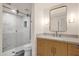 Modern bathroom with marble tile, a large shower, and stylish vanity at 1245 W 1St St # 103, Tempe, AZ 85281