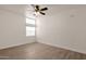 Well-lit bedroom featuring wood-look floors and a ceiling fan at 1245 W 1St St # 103, Tempe, AZ 85281