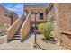 Condo building with stairs and landscaping at 1245 W 1St St # 103, Tempe, AZ 85281