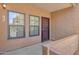 Private condo entry with security door at 1245 W 1St St # 103, Tempe, AZ 85281