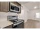 Modern kitchen with stainless steel appliances and ample counter space at 1245 W 1St St # 103, Tempe, AZ 85281