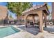 Relaxing pool area with shaded seating and patio at 1245 W 1St St # 103, Tempe, AZ 85281