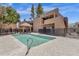 Community pool with patio and building views at 1245 W 1St St # 103, Tempe, AZ 85281