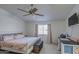 Main bedroom with a king-size bed and workspace at 13842 S 40Th St # 1004, Phoenix, AZ 85044