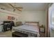 Spacious bedroom with a king-size bed and an office area at 13842 S 40Th St # 1004, Phoenix, AZ 85044