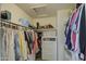 Large walk-in closet with ample shelving and hanging space at 13842 S 40Th St # 1004, Phoenix, AZ 85044