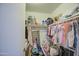 Well-organized closet with shelving and hanging rods at 13842 S 40Th St # 1004, Phoenix, AZ 85044