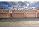 Three-car garage with individual doors at 13842 S 40Th St # 1004, Phoenix, AZ 85044