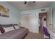 Bright bedroom with daybed, built-in closet, and access to hallway at 13872 N 89Th St, Scottsdale, AZ 85260