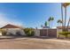 Brown wooden gate leading to the backyard at 13872 N 89Th St, Scottsdale, AZ 85260