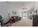 Living room with access to the backyard and a view of the pool at 13872 N 89Th St, Scottsdale, AZ 85260