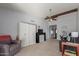 Living room with built-in shelving and a neutral color palette at 13872 N 89Th St, Scottsdale, AZ 85260