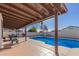 Inviting backyard pool with patio cover and seating area at 13872 N 89Th St, Scottsdale, AZ 85260