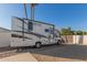 Class A RV parked in the driveway at 13872 N 89Th St, Scottsdale, AZ 85260