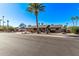 Single-story home with landscaped yard and two-car garage at 1518 N 62Nd Pl, Mesa, AZ 85205