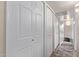 Bright hallway with ample closet space and neutral wall tones at 1518 N 62Nd Pl, Mesa, AZ 85205