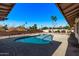 Sparkling pool with ample deck space for sunbathing at 1518 N 62Nd Pl, Mesa, AZ 85205