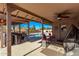 Inviting poolside patio with seating and grilling area at 1518 N 62Nd Pl, Mesa, AZ 85205