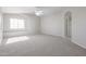 Spacious bedroom with carpeted floors and ceiling fan at 16370 W Adams St, Goodyear, AZ 85338