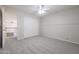 Bedroom with double-door closet and view of upstairs loft at 16370 W Adams St, Goodyear, AZ 85338