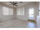 Well-lit dining area with tile flooring and access to a patio at 16370 W Adams St, Goodyear, AZ 85338