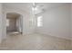 Bright dining area with tile floors and views to the living room at 16370 W Adams St, Goodyear, AZ 85338