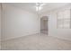 Open dining area with tile floors and views into the living room at 16370 W Adams St, Goodyear, AZ 85338