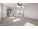 Open loft area with a view of the staircase at 16370 W Adams St, Goodyear, AZ 85338