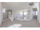 Loft hallway with access to bedrooms and a bathroom at 16370 W Adams St, Goodyear, AZ 85338