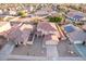 Aerial view of house and surrounding neighborhood at 16765 W Hadley St, Goodyear, AZ 85338