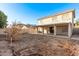 Large backyard with covered patio and space for landscaping at 16765 W Hadley St, Goodyear, AZ 85338