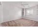 Bright bedroom with ceiling fan and large closet at 16765 W Hadley St, Goodyear, AZ 85338