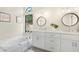 Main bathroom with double vanity and soaking tub at 17014 E De Anza Dr, Fountain Hills, AZ 85268