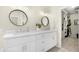 Modern bathroom with double vanity and walk-in closet at 17014 E De Anza Dr, Fountain Hills, AZ 85268