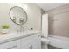 Modern bathroom with white vanity and bathtub at 17014 E De Anza Dr, Fountain Hills, AZ 85268