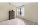 Well lit bedroom with large window and dresser at 17014 E De Anza Dr, Fountain Hills, AZ 85268