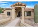 Front view of house with columns and walkway at 17014 E De Anza Dr, Fountain Hills, AZ 85268